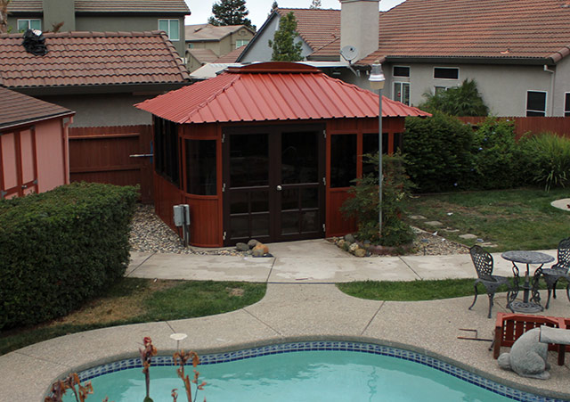 an Aspen gazebo beside a swimming pool