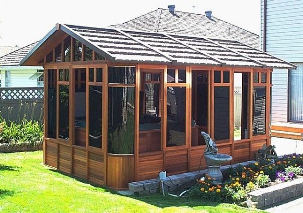 a chalet gazebo in the garden