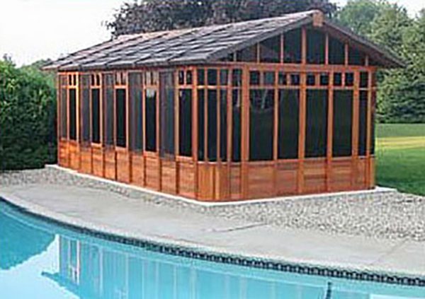 chalet gazebo beside a swimming pool