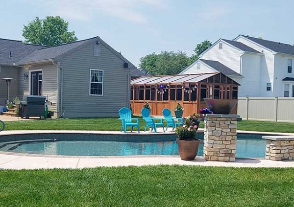 gazebo beside a swimming pool